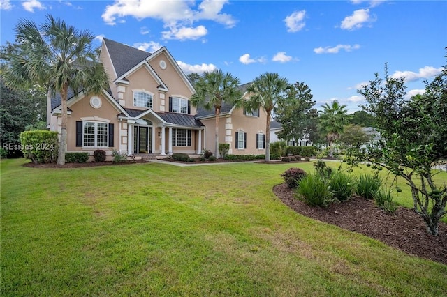 view of front of property with a front yard