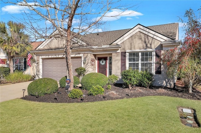 single story home featuring a garage and a front lawn