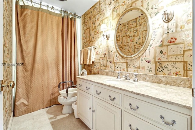 bathroom featuring a shower with curtain, vanity, and toilet