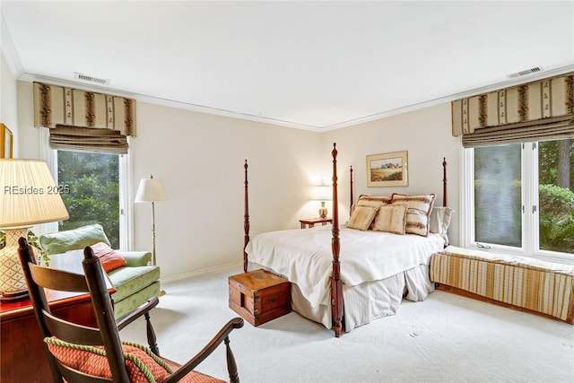 carpeted bedroom with crown molding