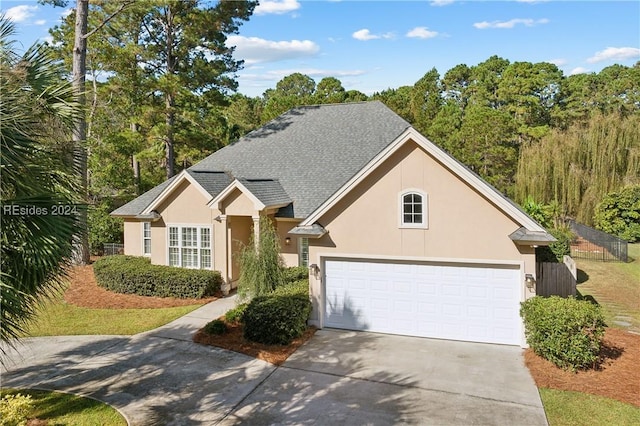 view of front of property featuring a garage