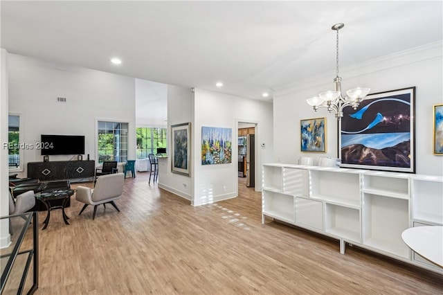 interior space featuring a chandelier and light hardwood / wood-style floors