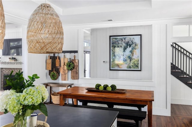 dining space featuring dark hardwood / wood-style flooring