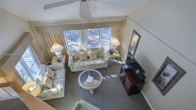 living room with carpet, plenty of natural light, and ceiling fan