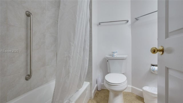 bathroom with shower / tub combo with curtain and toilet