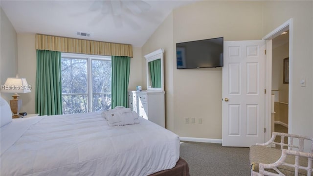 carpeted bedroom featuring vaulted ceiling and ceiling fan