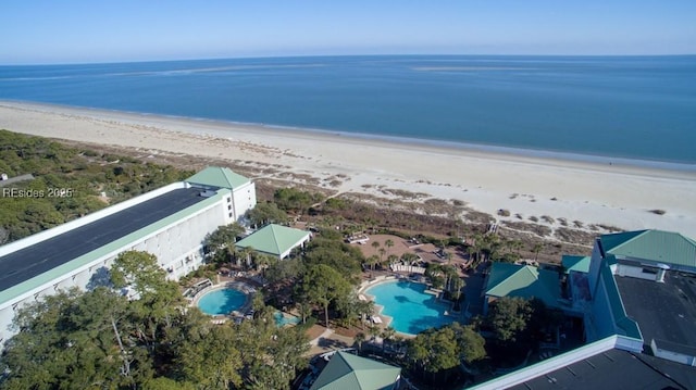 bird's eye view with a view of the beach and a water view