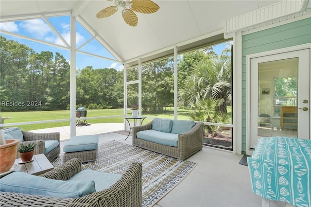 sunroom / solarium with vaulted ceiling and ceiling fan