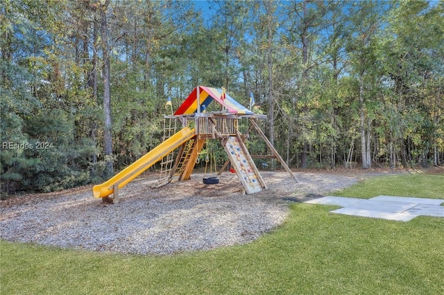 view of play area with a yard