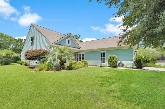 view of front of home with a front yard