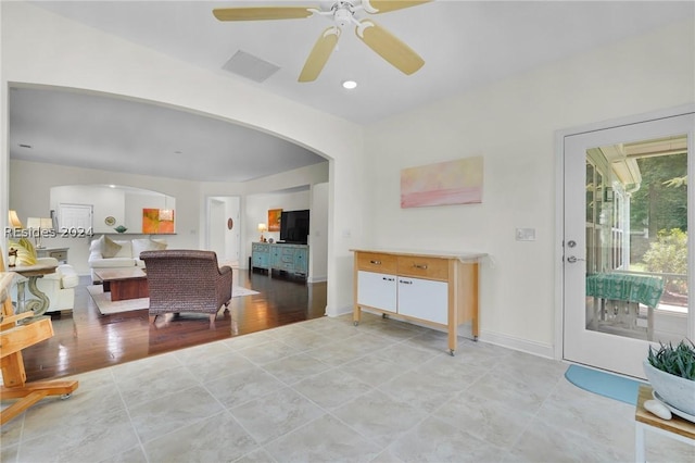 living room featuring ceiling fan