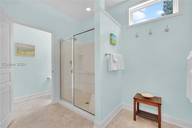 bathroom featuring an enclosed shower