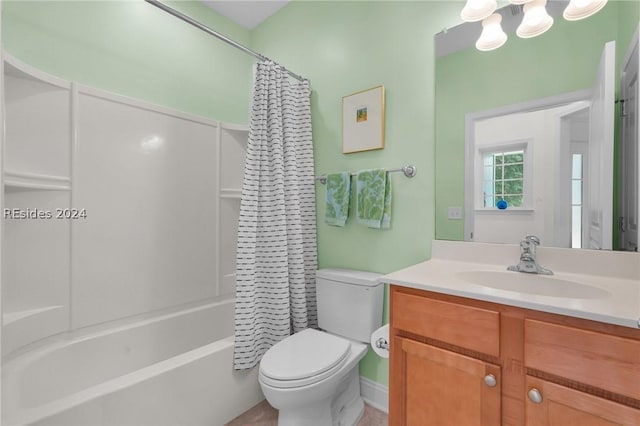 full bathroom featuring vanity, toilet, and shower / bath combo with shower curtain