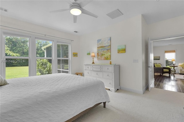 bedroom featuring ceiling fan and carpet floors