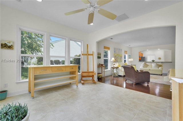 living room with ceiling fan