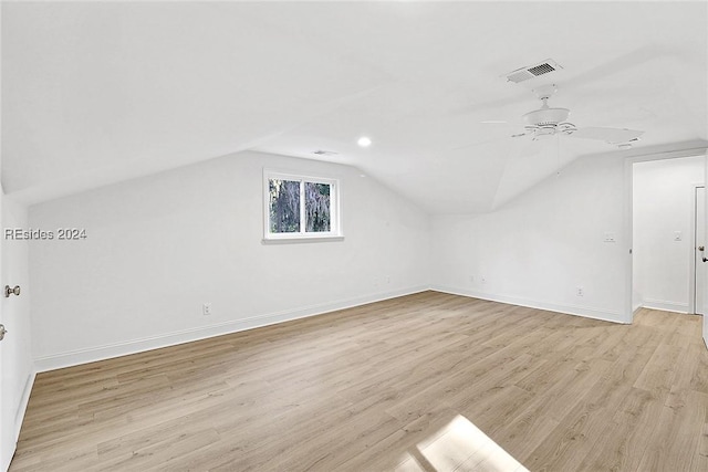 bonus room featuring vaulted ceiling, ceiling fan, and light wood-type flooring