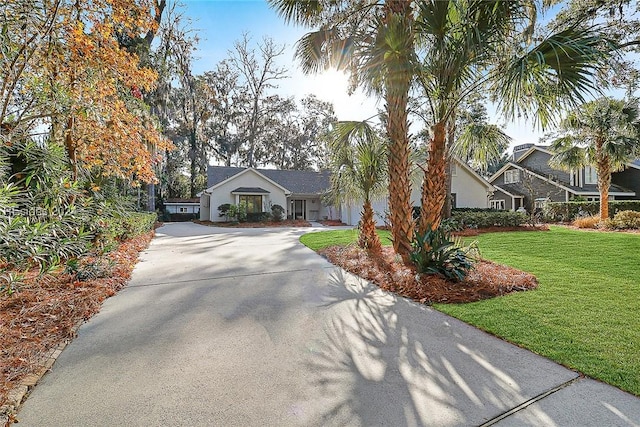 view of front of property with a front lawn