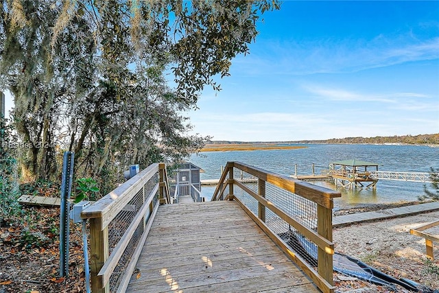 view of dock with a water view