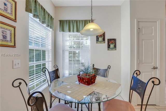 dining room featuring light tile patterned flooring