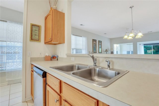 kitchen featuring pendant lighting, sink, stainless steel dishwasher, light tile patterned floors, and light brown cabinets