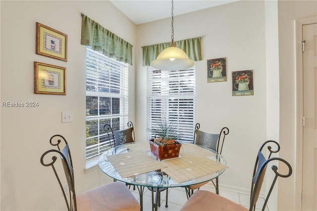 dining area with tile patterned floors