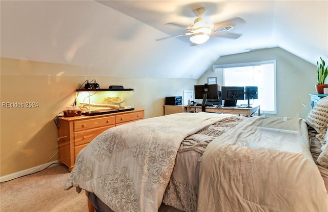 bedroom featuring vaulted ceiling, light carpet, and ceiling fan