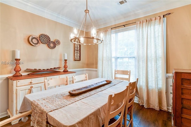 dining room featuring crown molding, a notable chandelier, and dark hardwood / wood-style flooring