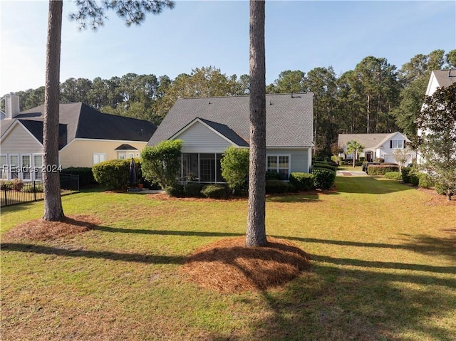 exterior space with a front yard