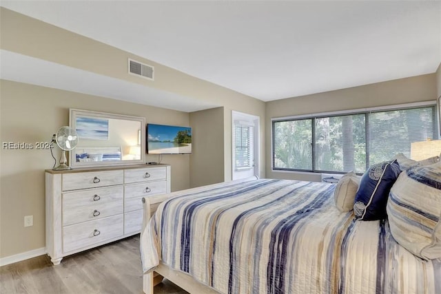 bedroom featuring light hardwood / wood-style flooring