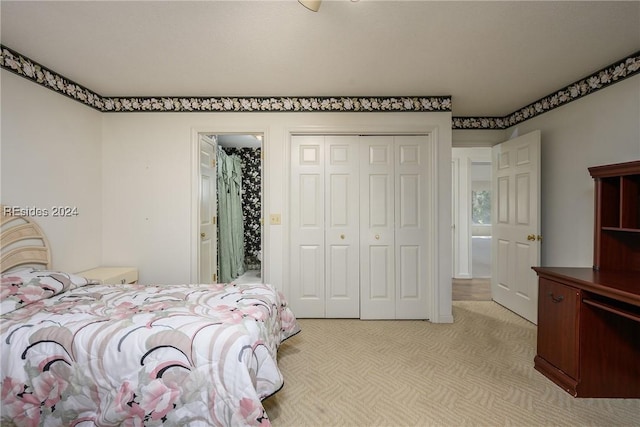 bedroom featuring light colored carpet