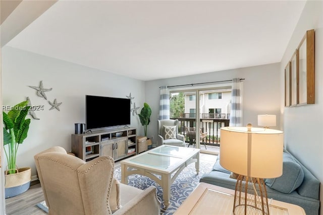 living room with light hardwood / wood-style floors