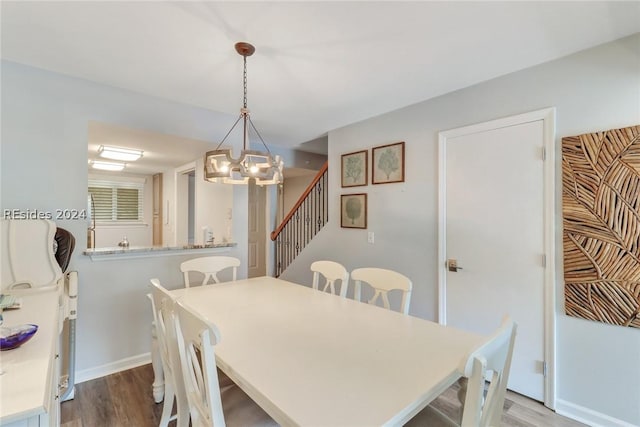 dining area featuring hardwood / wood-style flooring