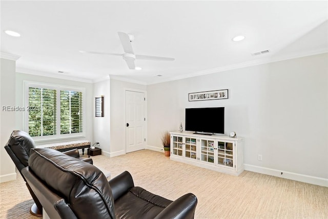 living room featuring ornamental molding and ceiling fan