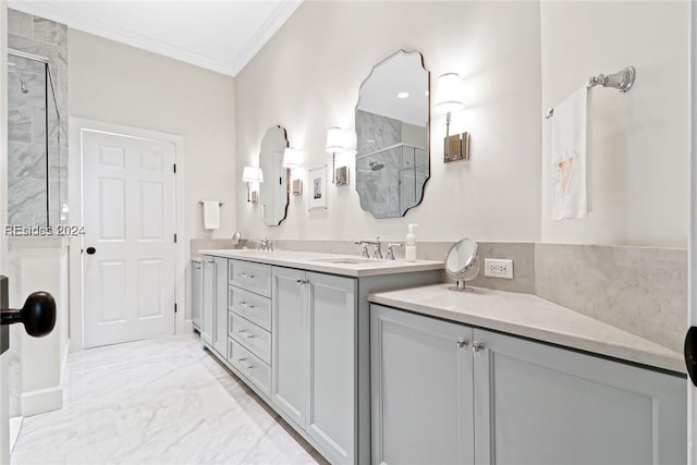 bathroom featuring crown molding, vanity, and a shower