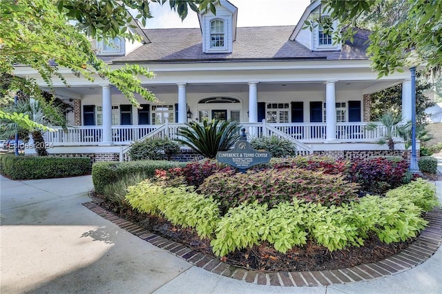 view of front of house featuring covered porch