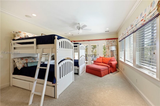 bedroom with ornamental molding, light carpet, ceiling fan, and french doors