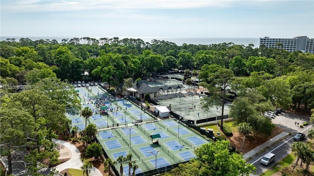 birds eye view of property with a water view