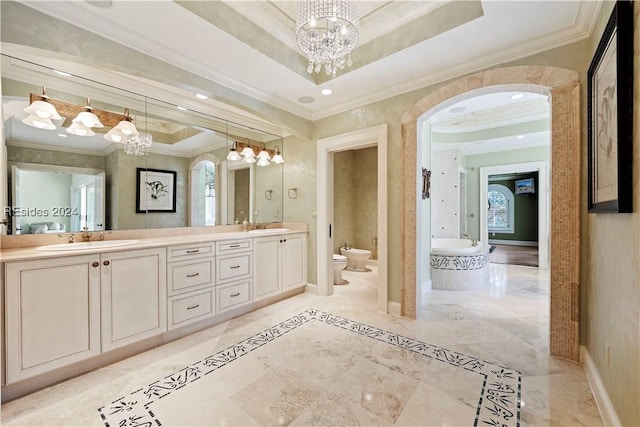 bathroom featuring ornamental molding, a bidet, a washtub, and a tray ceiling