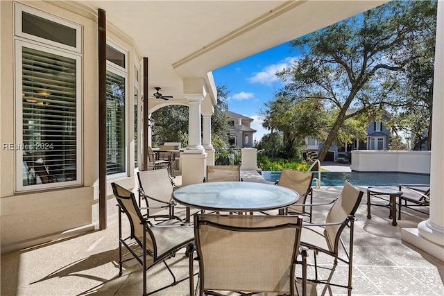 view of patio / terrace featuring ceiling fan