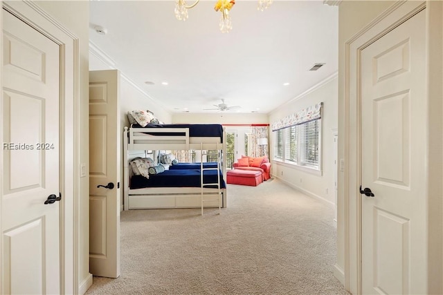 bedroom featuring ornamental molding and light carpet