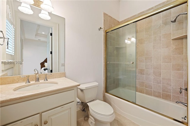 full bathroom with vanity, toilet, and bath / shower combo with glass door