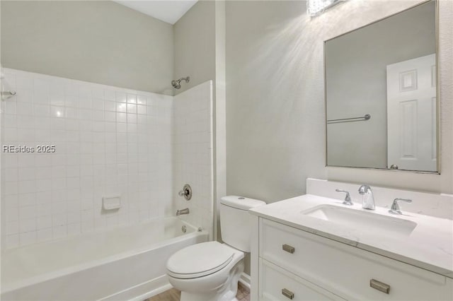 full bathroom with washtub / shower combination, vanity, and toilet