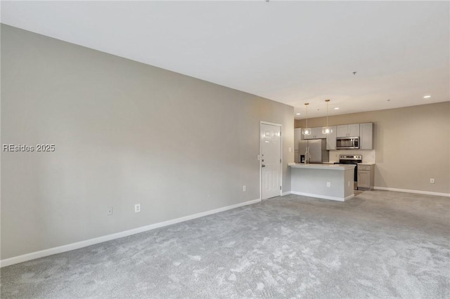 unfurnished living room featuring light colored carpet