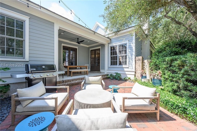 view of patio featuring ceiling fan and outdoor lounge area