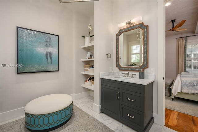 bathroom featuring vanity and built in features