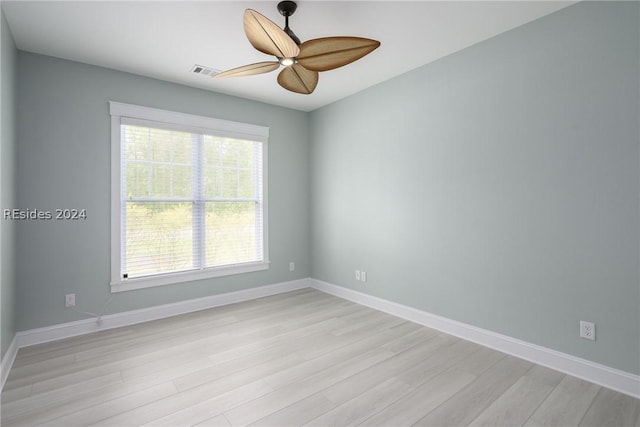 unfurnished room with light hardwood / wood-style flooring and ceiling fan