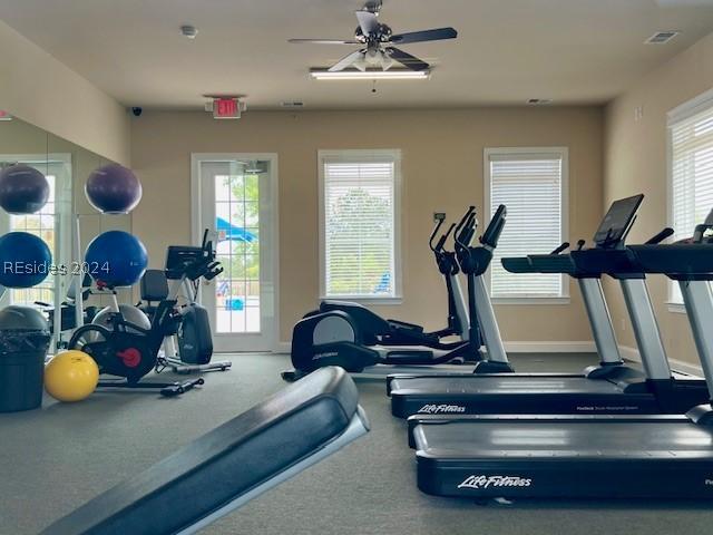 workout area with ceiling fan