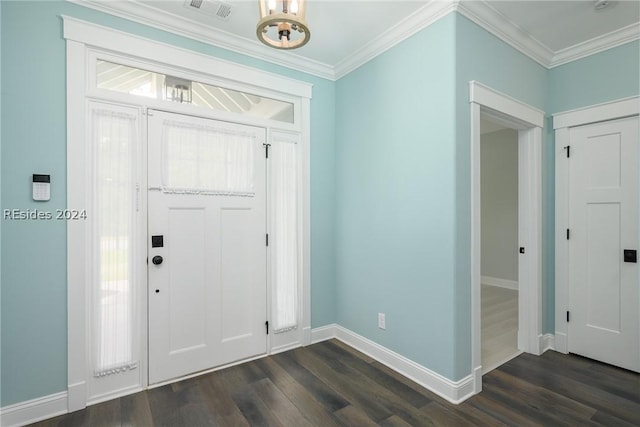 entrance foyer featuring dark hardwood / wood-style flooring and ornamental molding