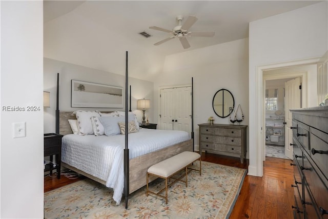 bedroom featuring hardwood / wood-style flooring, ceiling fan, vaulted ceiling, and a closet