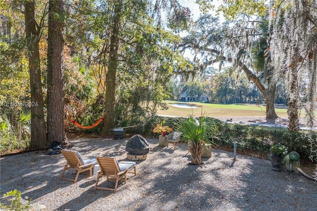 view of patio with an outdoor fire pit